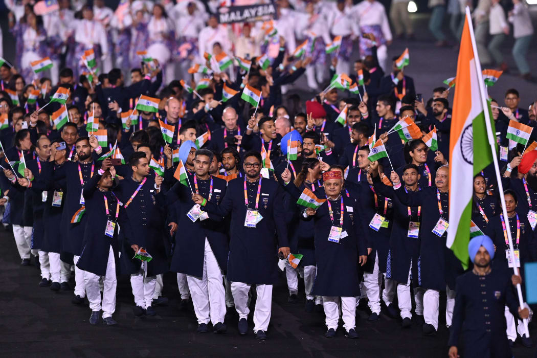 Athletes for Team India take part in the opening ceremony for the Commonwealth Games at the Alexander Stadium in Birmingham, central England, on July 28, 2022. (Photo by Glyn KIRK / AFP)