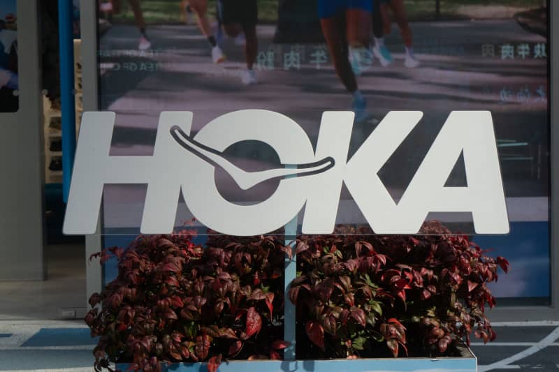 The HOKA name and logo outside a store in China.
