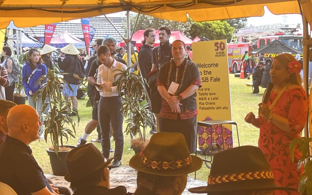 ASB Polyfest Director Seiuli Terri Leo-Mauu delivers a powerful welcome to the Prime Minister, calling for sustainable funding, formal recognition, and a permanent home for the world’s largest cultural youth festival. g LDR SINGLE USE