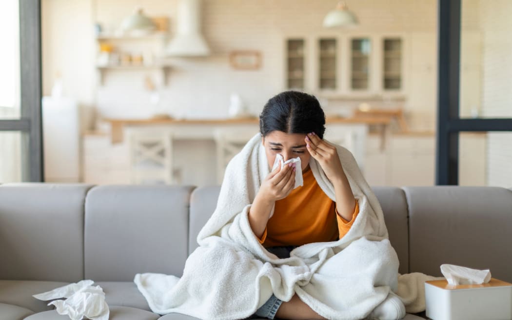 Woman with a cold or flu