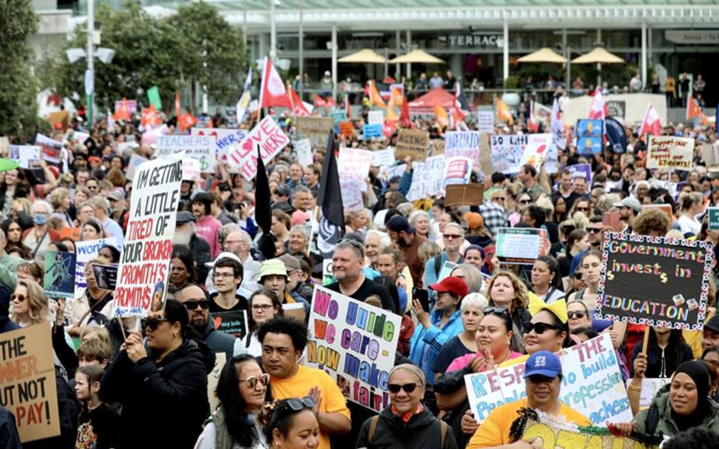 Protesters take part in October 2025's 'mega strike' in Auckland.