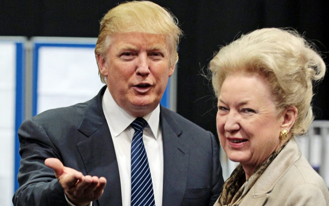 US property tycoon Donald Trump is pictured with his sister Maryanne Trump Barry as they adjourn for lunch during a public inquiry over his plans to build a golf resort near Aberdeen, at the Aberdeen Exhibition & Conference centre, Scotland, on June 10, 2008. AFP PHOTO/Ed Jones