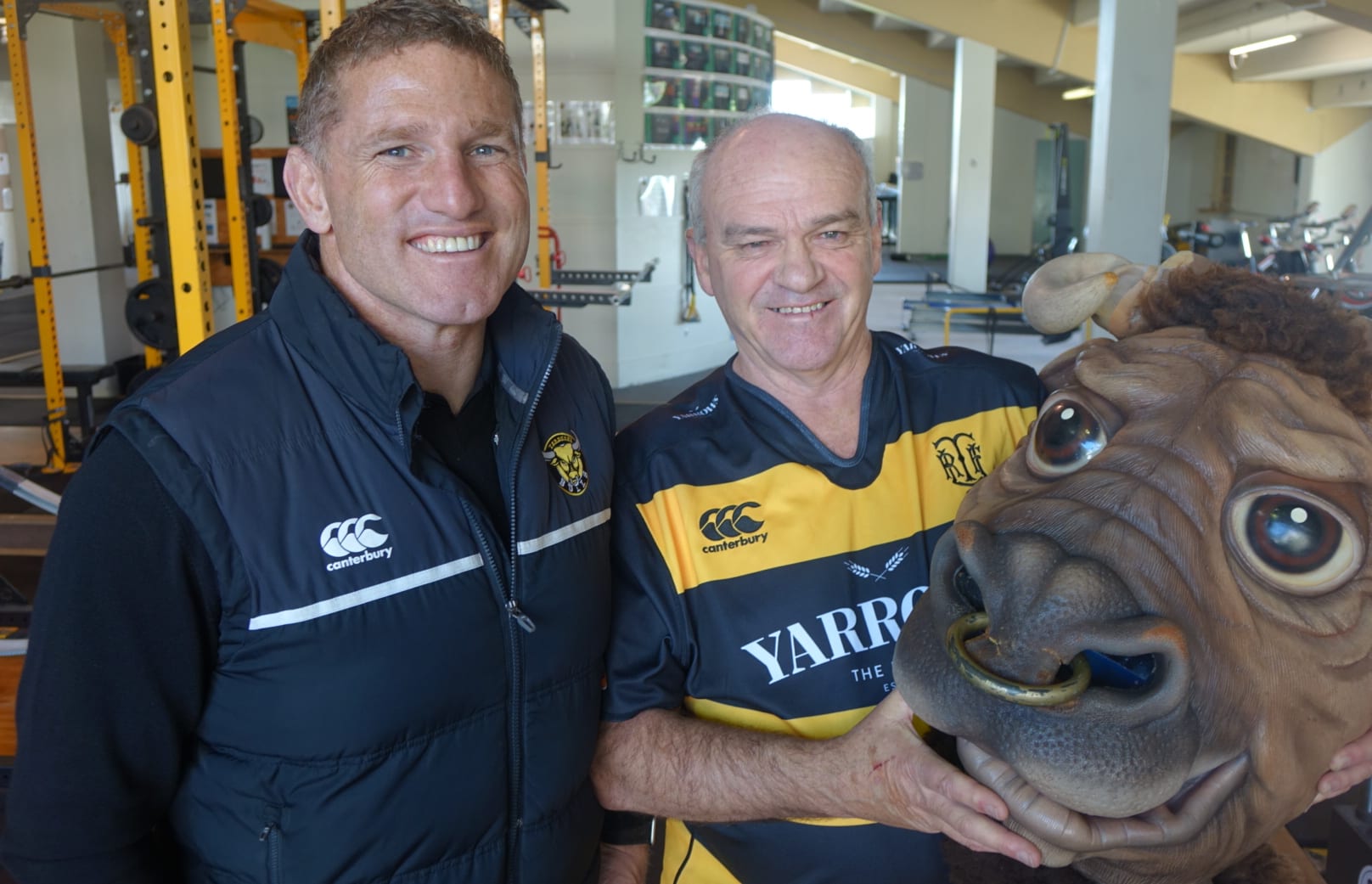 Taranaki Rugby Football Union boss Laurence Corlett and retiring Ferdie mascot Morris West.