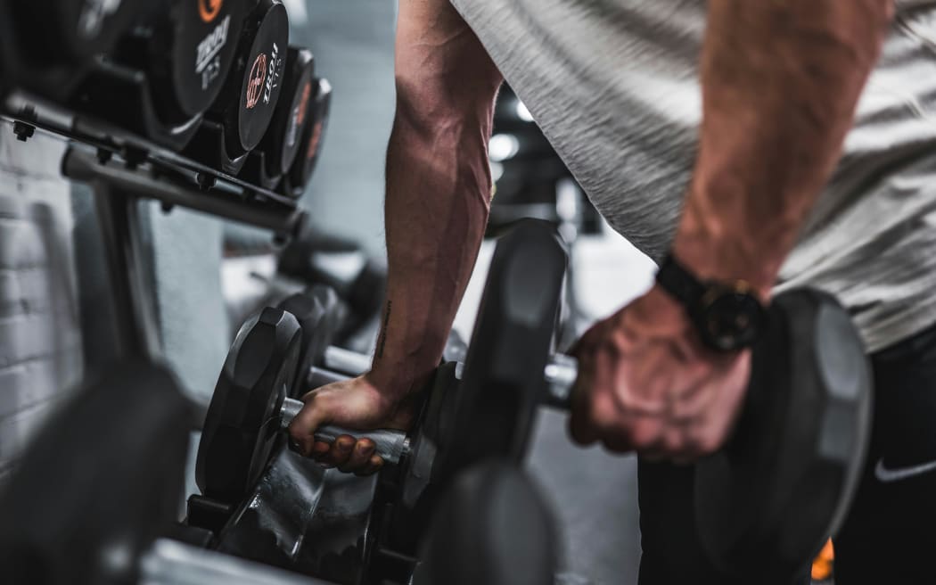 A man lifting weights.