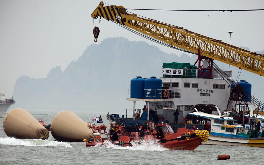 The coastguard and rescue workers are continuing recovery efforts.