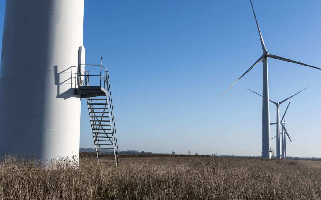 Wind turbines. (Photo by FreelanceImages/Universal Images / UIG / Science Photo Library via AFP)