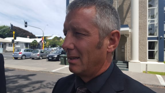Detective Senior Sergeant Blair Burnett outside the High Court in New Plymouth, at Taranaki farm manager David Roigard's sentencing on 15 February 2016 for the murder of his son, Aaron.
