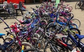 Upcycled bicycles at Henderson's Tipping Point op shop are an economical alternative to buy a new bike.