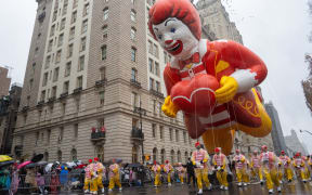The Ronald McDonald balloon floats down the street during the annual Macy's Thanksgiving Day Parade in New York City on November 28, 2024. (Photo by David Dee Delgado / AFP)