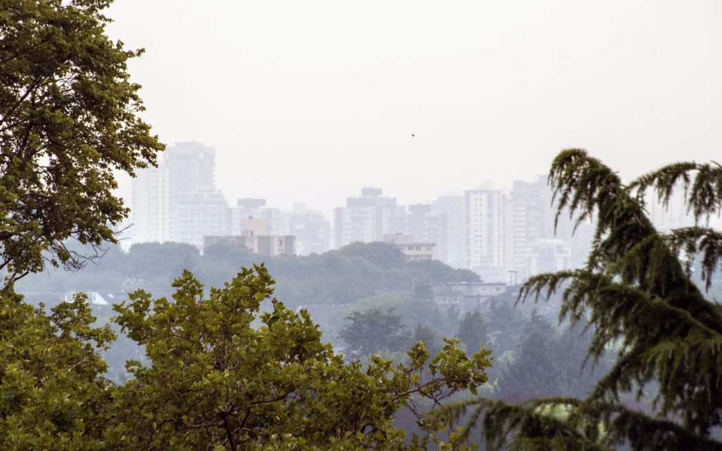 Smoke from wildfires in British Columbia drift towards Vancouver, covering the city in smoke for a fourth day on Friday.