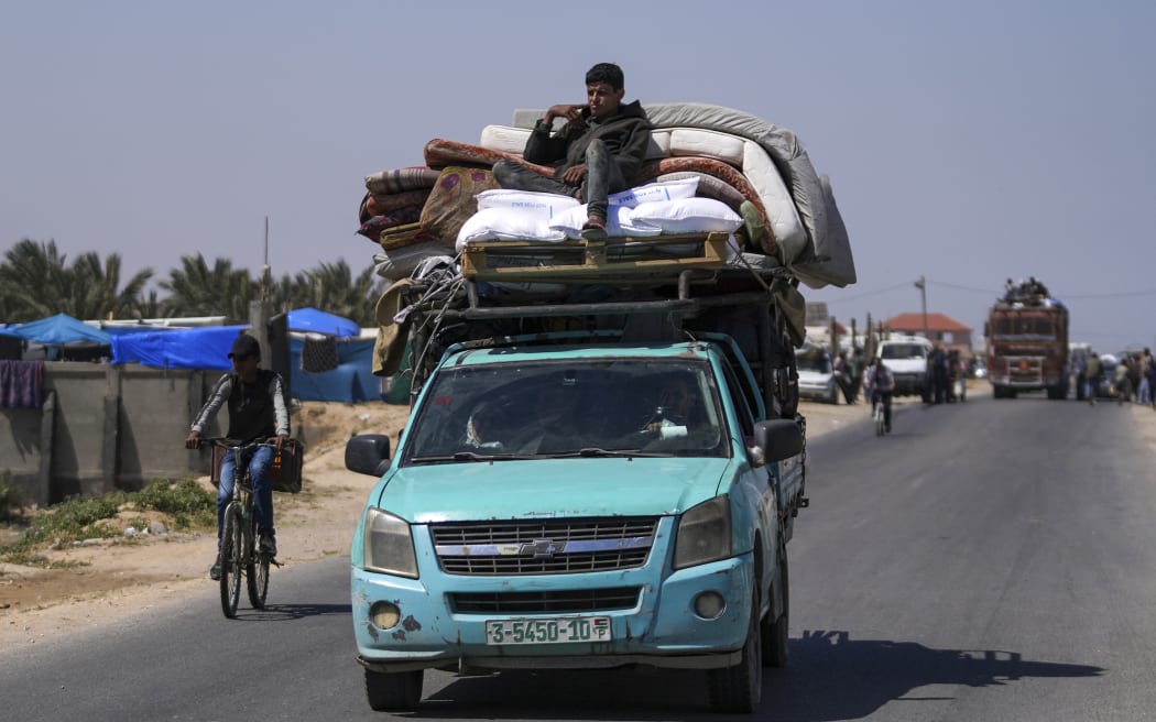 Displaced Palestinians arrive in central Gaza after fleeing from the southern Gaza city of Rafah. In Deir al Balah, Gaza Strip, on Thursday, 9 May, 2024.