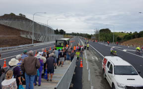 Pedestrians checking out the Kapiti Expressway ahead of its opening to traffic.