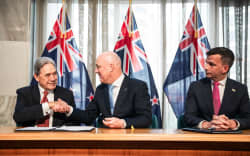 NZ First leader Winston Peters, National Party leader Christopher Luxon and ACT Party leader David Seymour at the formal signing ceremony on 24 November, 2023.