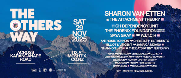 A poster showing the lineup for The Others Way festival. The names of artists are written in lines in front of a photo of a mountain range.