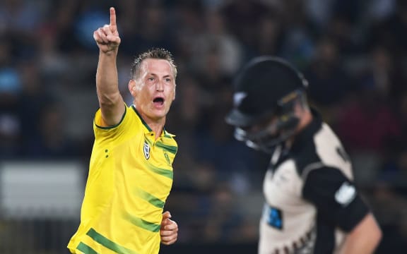 South Africa's Chris Morris celebrates the dismissal of Colin Monroe.