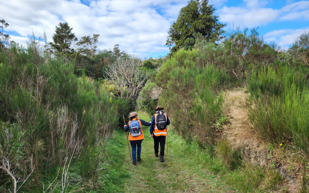 Whaitaima TeWhare and Jeffrey Addison set off through the Opepe reserve