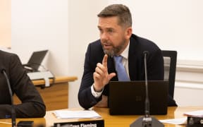 National Party MP Greg Fleming questions a submitter in select committee.
