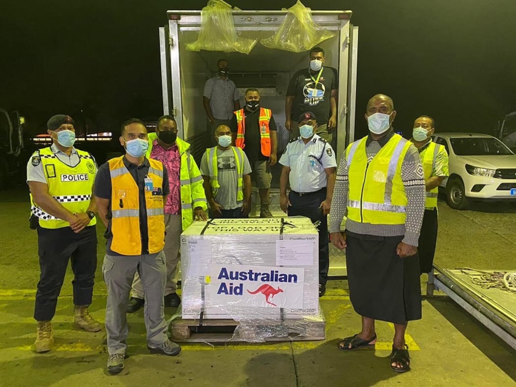Australian and Fijian government officials at the Nadi International Airport after the arrival of 100,000 doses of the AstraZeneca vaccine.