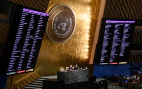Voting results are displayed during a UN General Assembly emergency meeting to discuss Russian annexations in Ukraine.