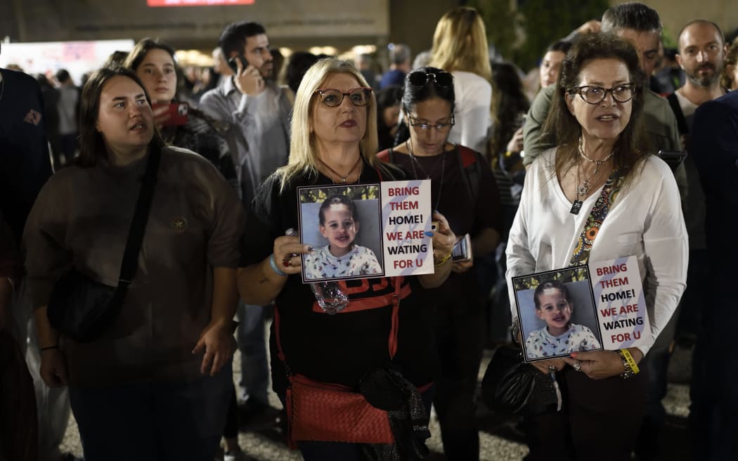 Israelis are gathering at the ''Hostages Square'' outside the Art Museum of Tel Aviv as the first group of Israeli hostages safely returns to Israel in Tel Aviv, Israel, on November 24, 2023. (Photo by Gili Yaari/NurPhoto) (Photo by Gili Yaari / NurPhoto / NurPhoto via AFP)