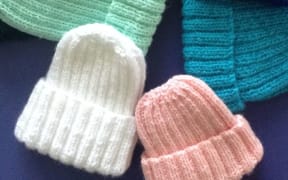 beanies knitted by prisoners