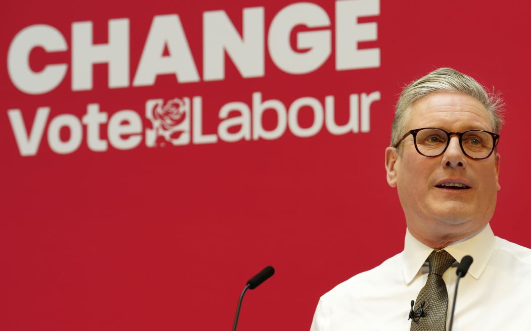 FILE - Britain's Labour Party leader Keir Starmer speaks on stage at the launch of the party's manifesto in Manchester, England, Thursday, June 13, 2024.
