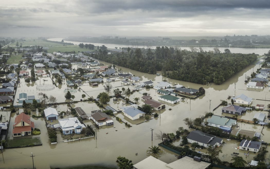 The flooded southeastern approach to Westport under flood in July 2021, with the Buller River in the background.