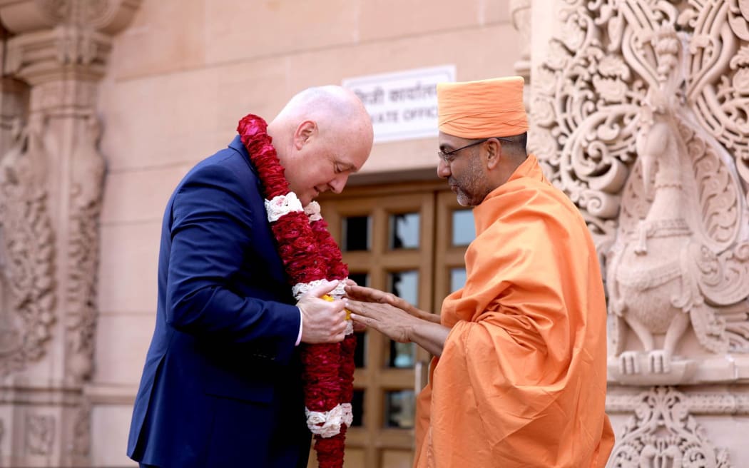 Christopher Luxon and Swami Gnanmuni Das at Swaminarayan Akshardham temple in New Delhi, India.