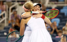 Gabriela Dabrowski of Canada and Erin Routliffe of New Zealand celebrate.