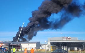 Six fire trucks are battling a blaze at the old Watties building in Hastings.