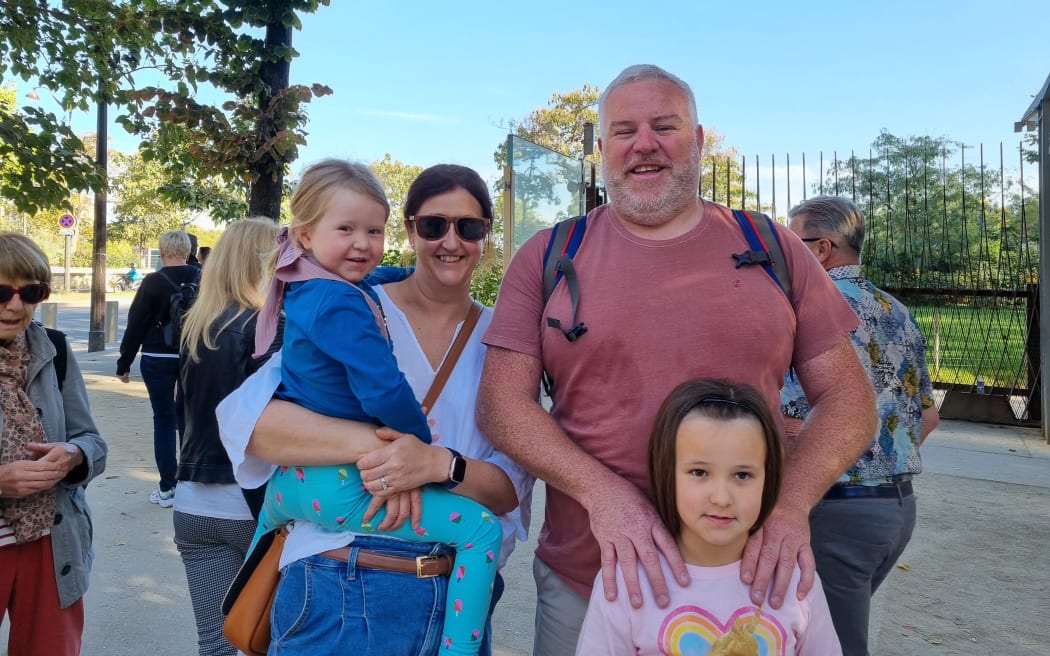 Scotland rugby fan Ali with his family in Paris for Rugby World Cup 2023.
