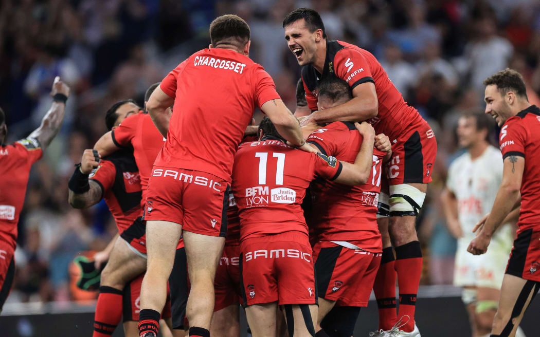Toulon players celebrate.