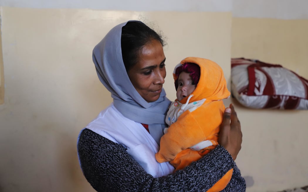 World Vision Afghanistan National Director, Asuntha Charles, visits World Vision's Health & Nutrition programme in Herat province, where children are suffering from hunger because of drought, which is already in its fifth year.
