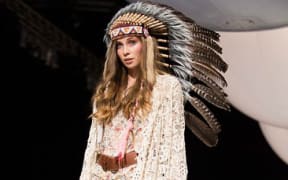 270814. Photo Michael Ng fashion.ngfoto.com. A model showcases designs by Trelise Cooper at New Zealand Fashion Week.