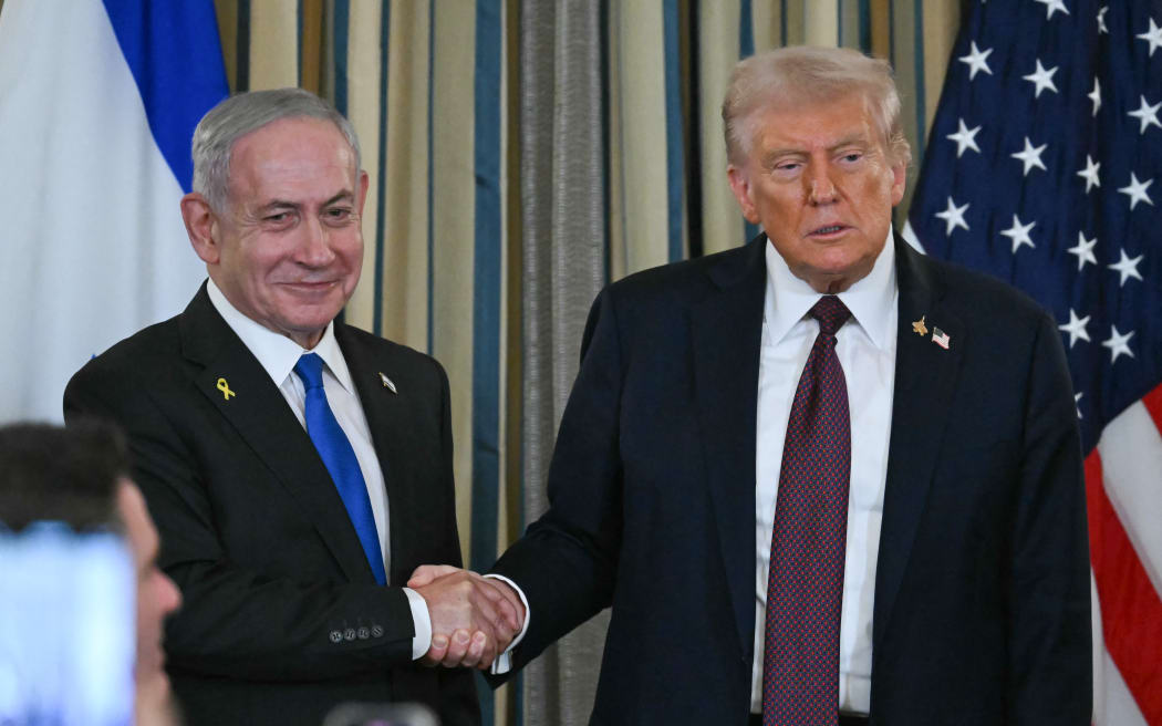 US President Donald Trump and Israeli Prime Minister Benjamin Netanyahu shake hands at the conclusion of a joint press conference in the State Dining Room of the White House in Washington, DC on September 29, 2025. Israeli Prime Minister Benjamin Netanyahu on September 29 said he supported US President Donald Trump's 20-point plan to end the war in Gaza.
"I support your plan to end the war in Gaza which achieves our war aims. It will bring back to Israel all our hostages, dismantle Hamas's military capabilities, end its political rule and ensure that Gaza never again poses a threat to Israel," said Netanyahu, speaking at a joint press conference with Trump at the White House. (Photo by ANDREW CABALLERO-REYNOLDS / AFP)