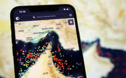 A MarineTraffic map shows a high concentration of ship beacons in the Strait of Hormuz, on 27 March, 2026.
