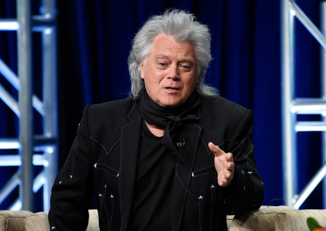 Country music performer Marty Stuart, a participant in the PBS documentary series "Country Music," takes part in a panel discussion during the 2019 Television Critics Association Summer Press Tour at the Beverly Hilton, in Beverly Hills, Calif.