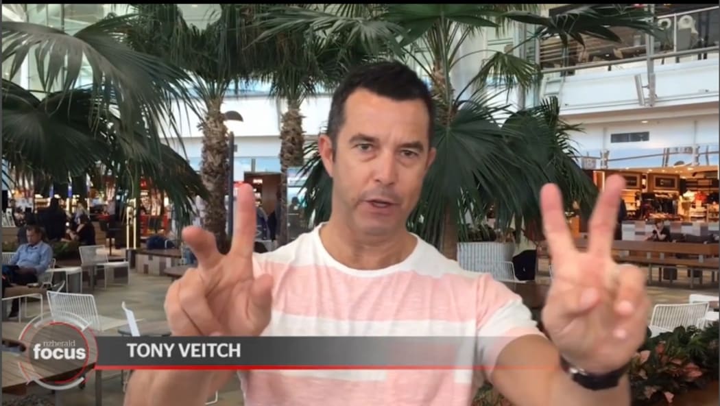 Picture of Herald Focus sports presenter doing his slot from Brisbane's airport last Monday.