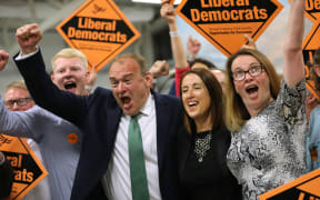 Liberal Democrat MP Ed Davey and Liberal Democrat candidate Jane Dodds celebrate after winning the Brecon and Radnorshire by-election at the Royal Welsh Showground on 2 August, 2019 in Wales.
