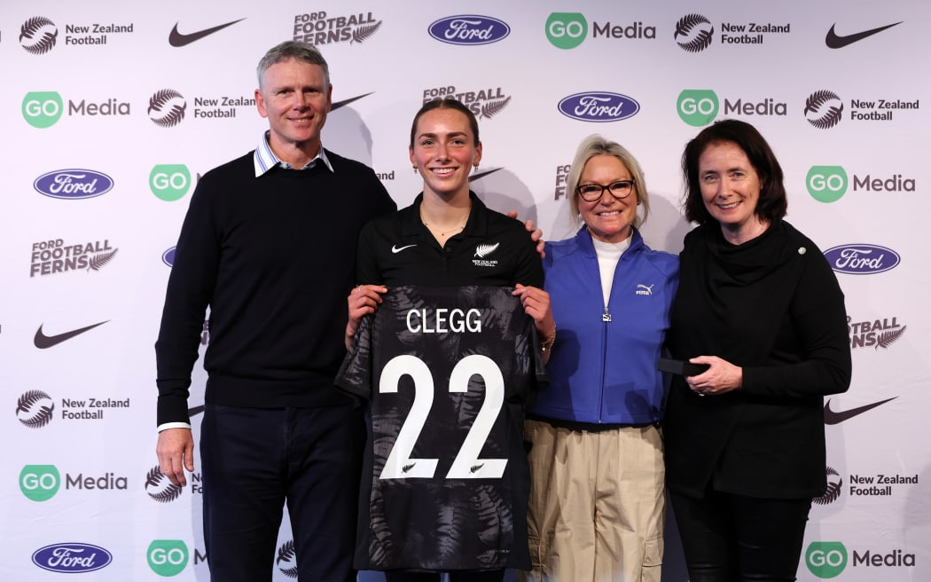 Milly Clegg during the New Zealand Football Ferns FIFA WWC team announcement with her family and a former Football Fern.