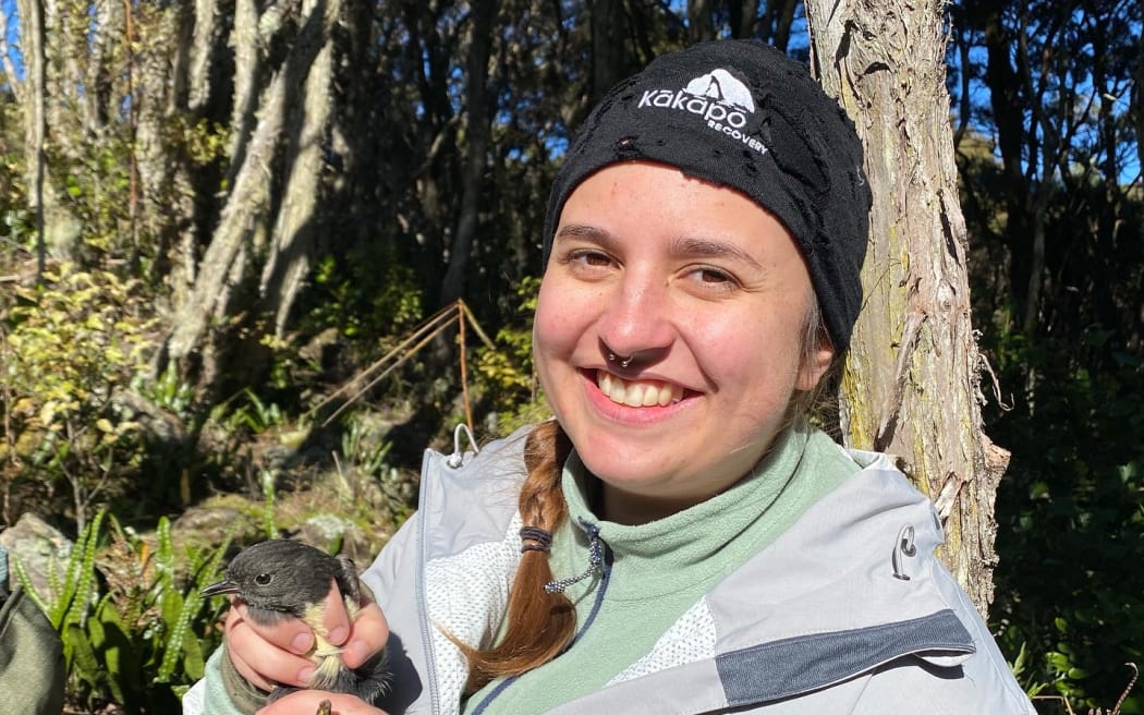 Ecologist and report author Manaia Permain-Fenton with a kakaruai.