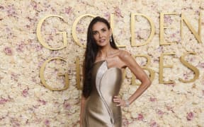 US actress Demi Moore arrives for the 82nd annual Golden Globe Awards at the Beverly Hilton hotel in Beverly Hills, California, on January 5, 2025.
