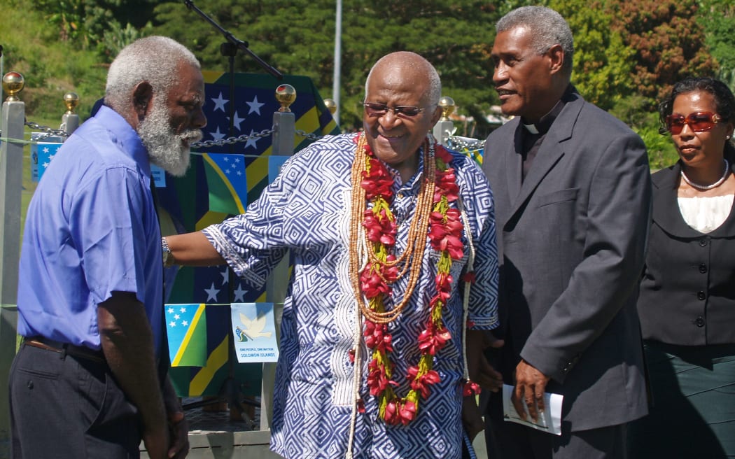May 1, 2009 shows South Africa's Archbishop Desmond Tutu (2nd-L) greeting the Truth and Reconciliation Commissioners George Kejoa (L), Chairman Father Sam Ata (2nd-R) and Caroline Laore (R)