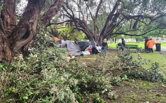 A cluster of homeless people took shelter under canvas and in cars at Pākaitore on the banks of Whanganui River during the February 15 storm and state of local emergency. Photo: Moana Ellis (single use only)