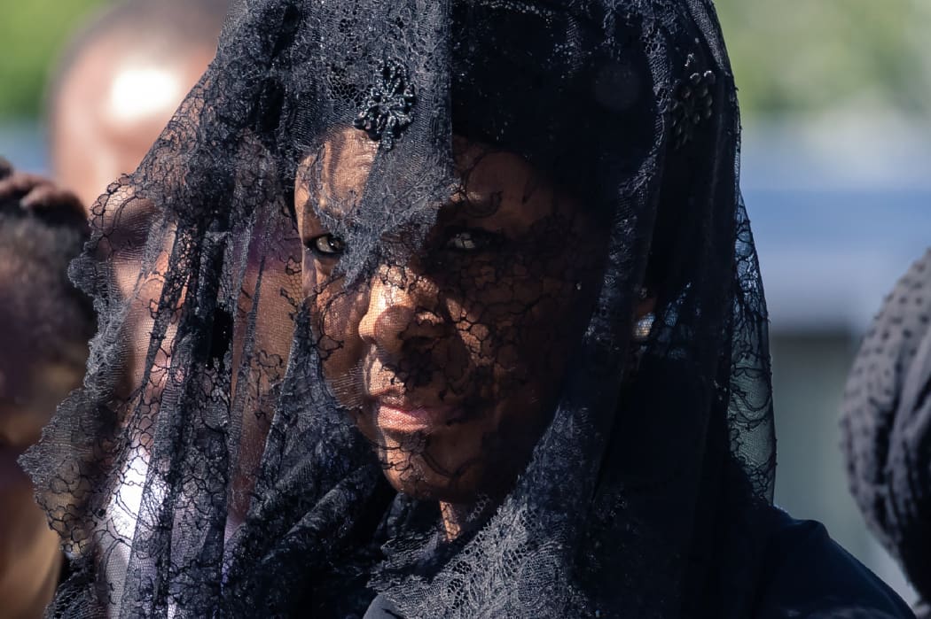 Former first lady Grace Mugabe looks on as she walks behind Robert Mugabe coffin during the burial of the former Zimbabwe leader at his home village in Kutama, on September 28, 2019.