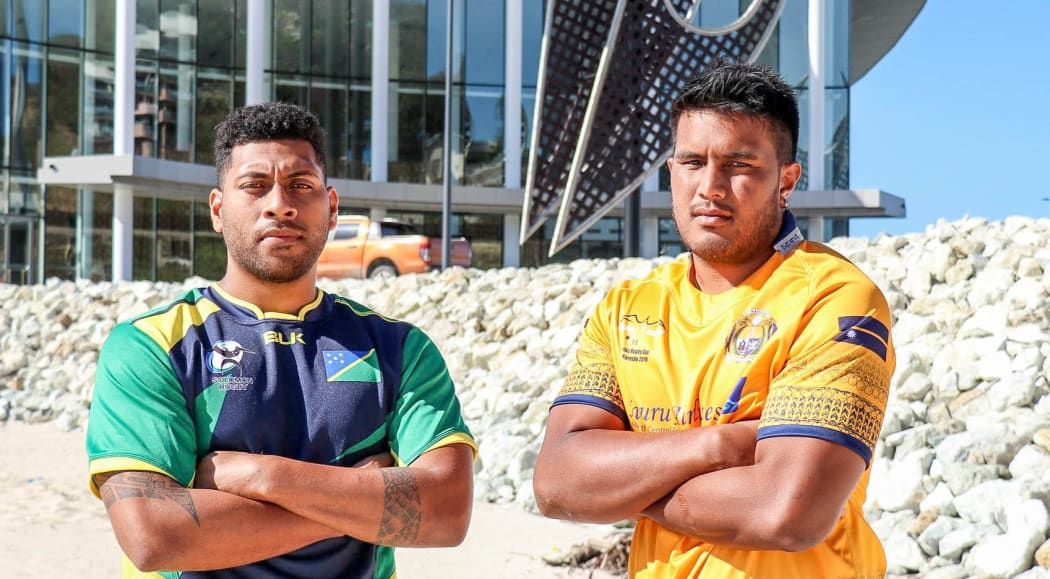 Solomon Islands captain Paul Tema and Nauru captain  Damon Adeang.