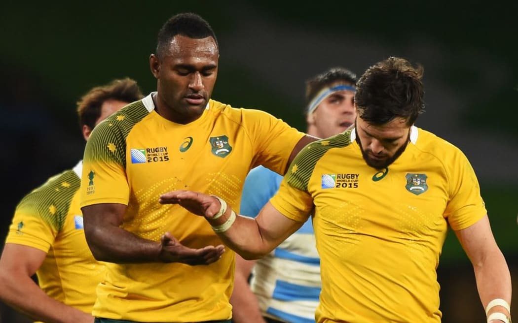 Wallabies Tevita Kuridrani and Adam Ashley-Cooper during the Rugby World Cup semi-final win over the Pumas at Twickenham, London, England. Sunday 25 October 2015. Copyright Photo: Andrew Cornaga / www.Photosport.nz