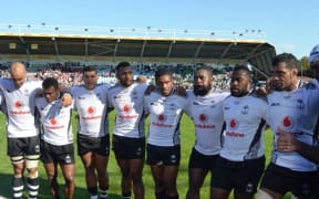 Fiji players huddle together during their pre-World Cup test against Canada in London.
