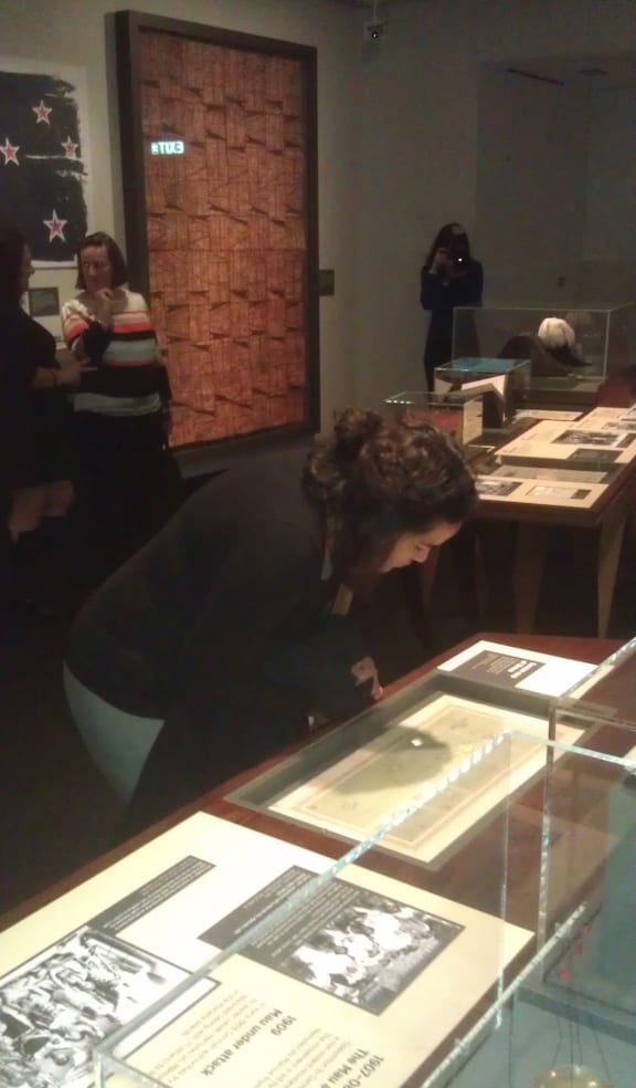 A visitor to the Entangled Islands exhibition.