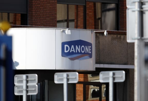 Danone sign on dairy plant in France.